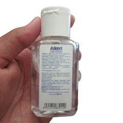 Hand holding AIKEN Antibacterial Hand Sanitizer 60ml Bottle – Instant Protection, Quick Drying & Non-Sticky Formula