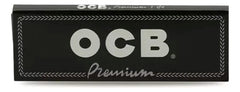OCB Premium Black Rolling Papers 1¼ – Close-up of a single black pack containing 50 ultra-thin sheets