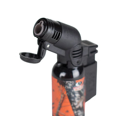 Side close-up of Eagle Torch PT116MOK mini torch lighter in Mossy Oak design with flip cap open, highlighting windproof jet flame nozzle and ignition safety structure.