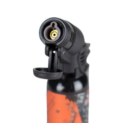 Close-up of Eagle Torch PT116MOK Mossy Oak lighter with flip cap open, showcasing detailed view of the windproof jet flame nozzle and ignition design.