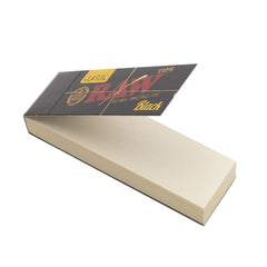 Close-up view of RAW Black Classic Tip showing unrefined fiber texture and natural brown tone