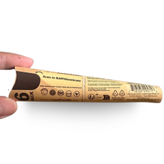 Hand holding the back of RAW Classic 1¼ Pre-Rolled Cones single pack – 6 cones, natural fibers, water-based gum for perfect seal.