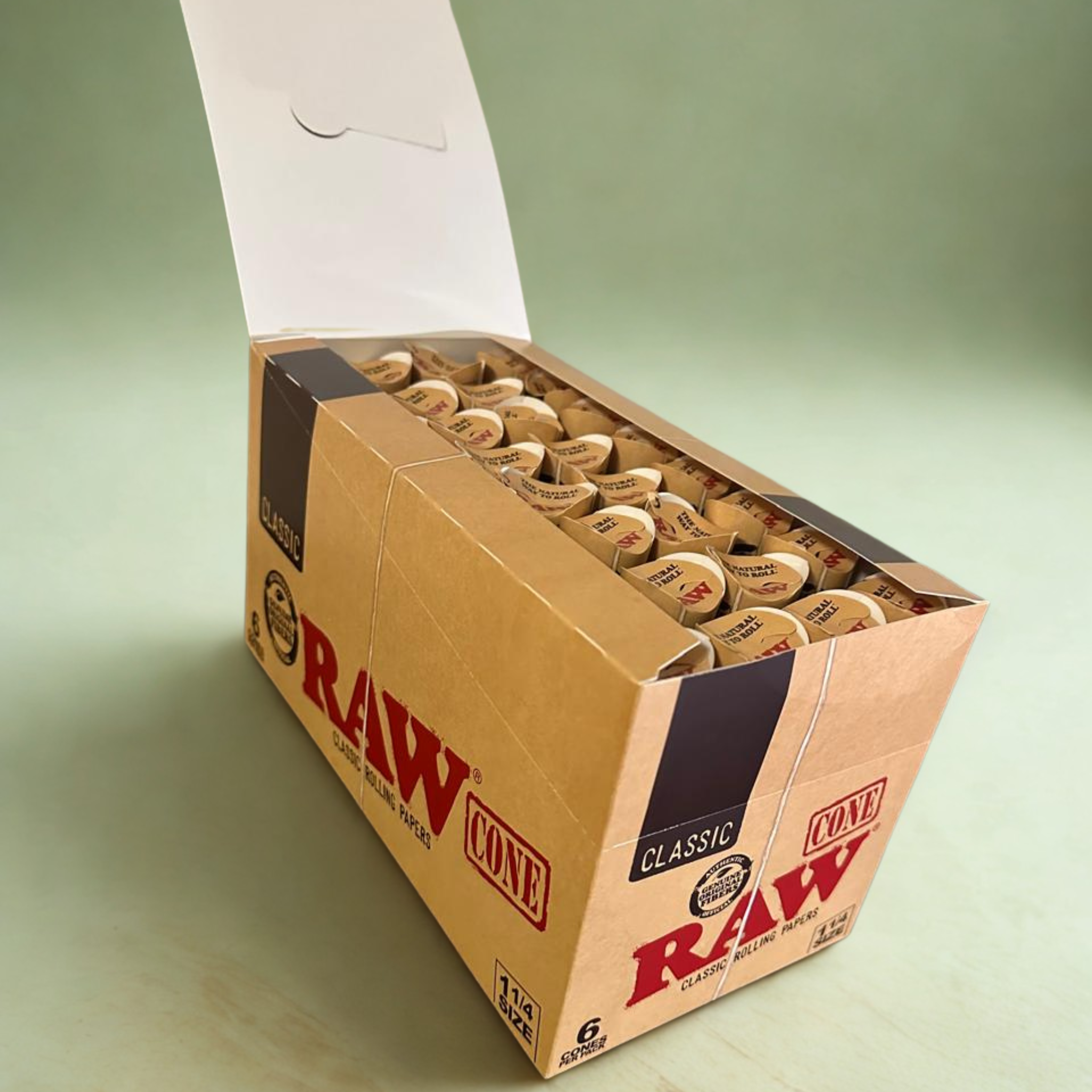 RAW Classic 1¼ Pre-Rolled Cones – Open Display Box Left-Angle, 192 Total Cones, Consistent Burn, Easy Filling.