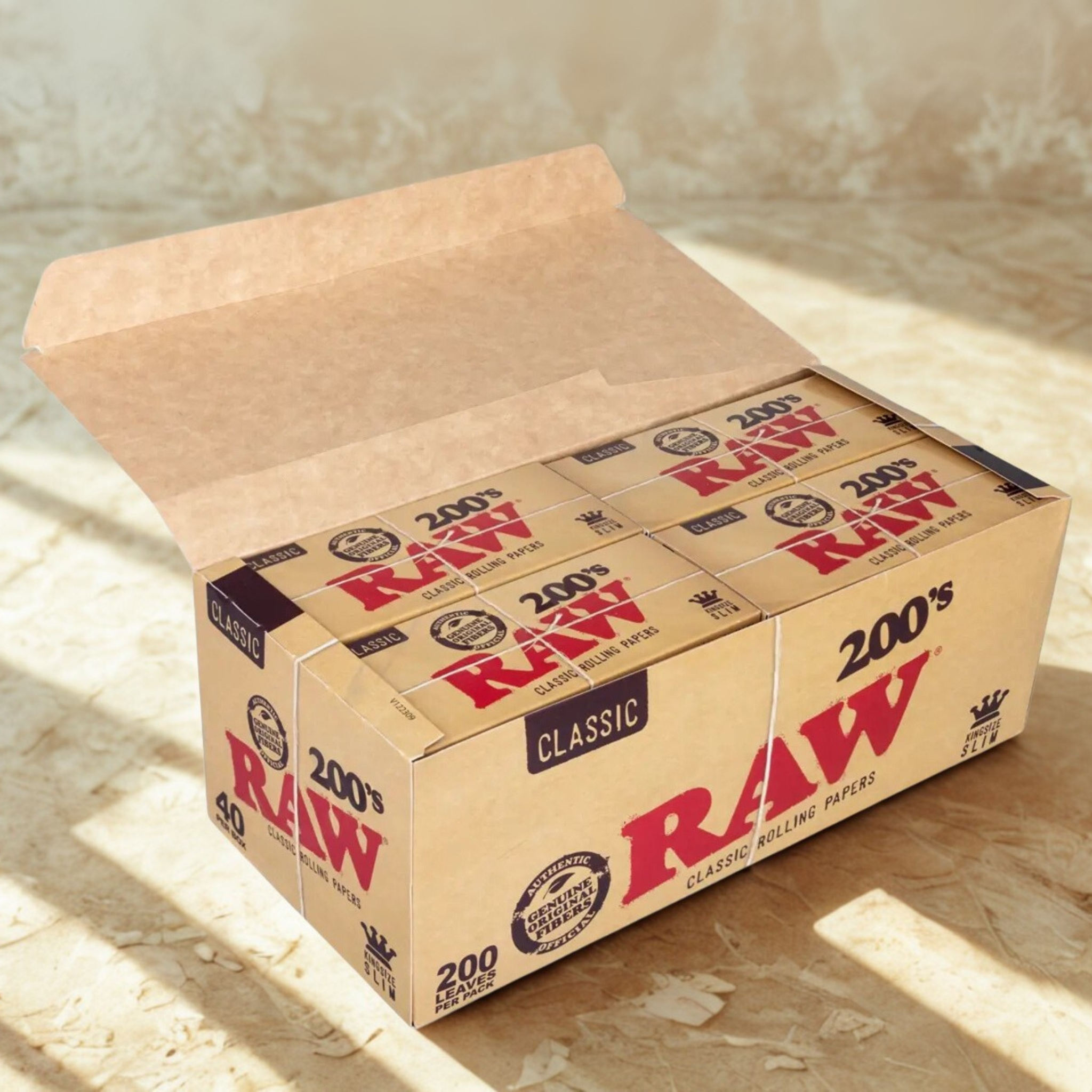 Display box of RAW Classic 200’s King-Size Slim Rolling Papers wholesale box – 40 packs of 200 leaves, natural acacia gum, slow burning, premium unrefined rolling paper