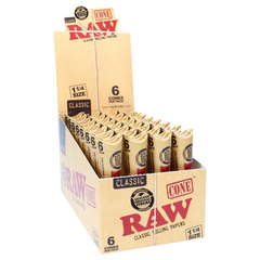 Display of RAW Classic 1¼ Pre-Rolled Cones – Open Display Box Showing 32 Packs × 6 Cones, 100% Natural Unrefined Fibers.