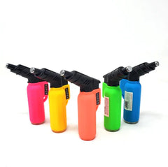 Five Xuper The Presser refillable torch lighters in assorted colors — Pink, Yellow, Orange, Green, and Blue — displayed outside the 20-count box, with 4 lighters per color. Windproof and child-resistant design.