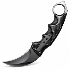 Black folding karambit knife detail